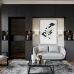 Vue frontale d’un salon contemporain avec des meubles muraux noirs intégrés, un canapé clair, une table basse noire et une grande œuvre d’art graphique au mur, ambiance élégante et épurée